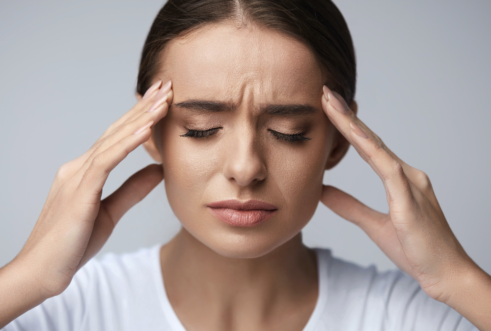 Lady Suffering from Headache 