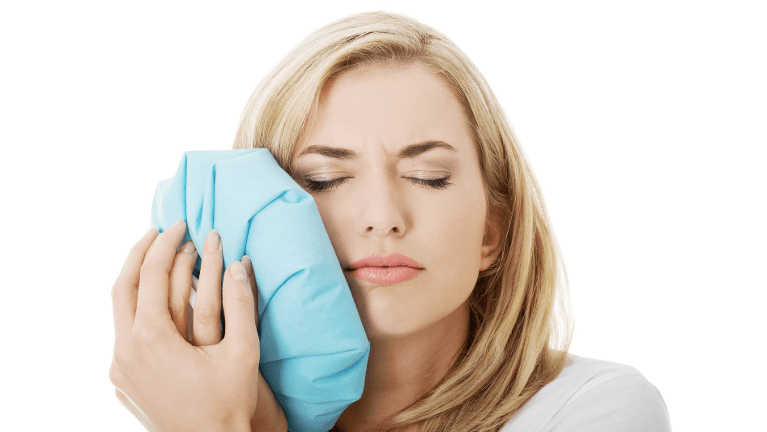Lady Suffering Toothache