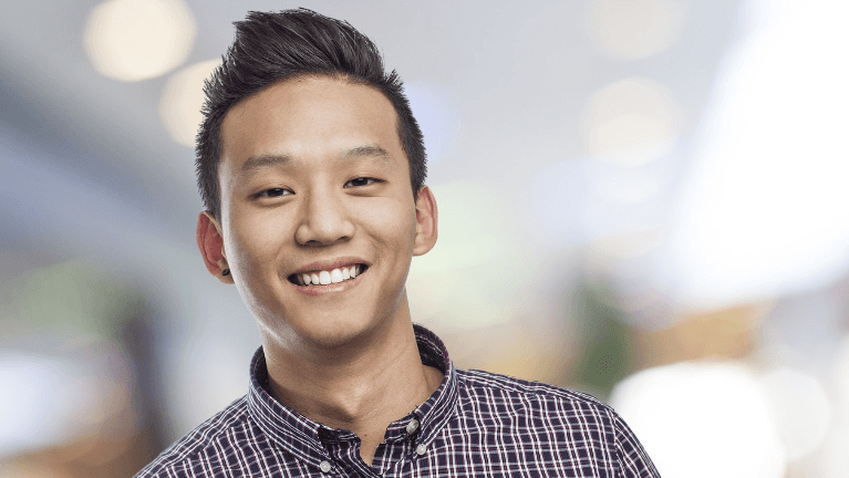 man in checkered shirt | emergency dentist nearby